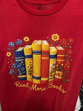 Read more books size small in red shirt